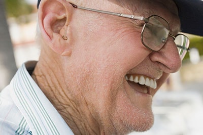 Senior Man Wearing a Digital Hearing Aid